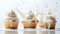 Cupcake splashing in milk, isolate on white background. Collection Royalty Free Stock Photo