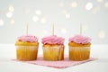 Cupcake Topper Mockup. White background with bokeh party fairy lights. Royalty Free Stock Photo