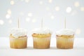 Cupcake Topper Mockup. White background with bokeh party fairy lights.