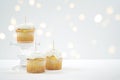 Cupcake Topper Mockup. White background with bokeh party fairy lights.