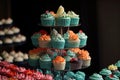 cupcake tower, with piped frosting and decorative toppings