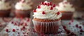 Cupcake With White Frosting and Red Sprinkles Royalty Free Stock Photo