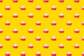 Cupcake on yellow background Royalty Free Stock Photo