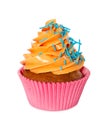 Cupcake with yellow cream and blue sprinkles Royalty Free Stock Photo