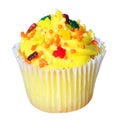 Cupcake with yellow frosting and colored sprinkles isolated on white. Royalty Free Stock Photo