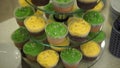 Cupcakes. Amazing chocolate cakes and cupcakes. Chocolate caramel cupcake with nuts and butterscotch syrup. Green and