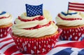 cupcakes with american flag decorated in red white and blue for 4th July celebration. concept Royalty Free Stock Photo