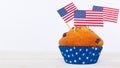 Cupcakes with american flag on white background