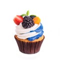 Cupcakes with berries on a white background. Isolated. Royalty Free Stock Photo