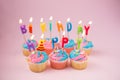 Happy birthday cupcakes with candles Royalty Free Stock Photo