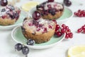Cupcakes with cherries and powder