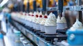 Cupcakes with cream topping on automated production line