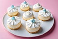 Cupcakes with creamy icing on a pink background. Template for displaying product presentation. Artificial Intelligence