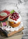 Cupcakes with curd cream and red currants