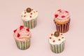 Cupcakes desert cream pink and white on pink background