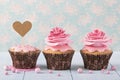 Cupcakes with heart cakepick Royalty Free Stock Photo
