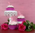 Cupcakes with high heel stiletto fondant shoes on stands Royalty Free Stock Photo