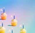 Cupcakes with lit candles