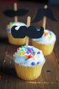 Cupcakes with moustaches Royalty Free Stock Photo