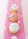 Cupcakes with pink icing Royalty Free Stock Photo