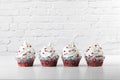 Cupcakes with sprinkled frosting on white background, red, white and blue Royalty Free Stock Photo