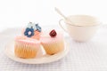 Cupcakes and white cup Royalty Free Stock Photo