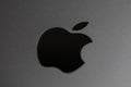 Cupertino, CA, US, 22.04.2020: black Apple logo on silver 16-inch MacBook Pro