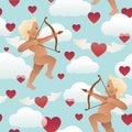 Cupid angel with bow and arrow aiming at someone`s heart. Royalty Free Stock Photo