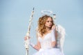 Cupid cute girl with a bow. Teen angel. Concept of innocent child. arrow and wings. Toddler girl wearing angel costume Royalty Free Stock Photo