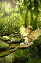 Cupid in fantasy forest Royalty Free Stock Photo
