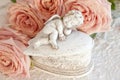 Cupid with Pink Roses