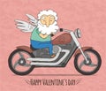 Cupid rides on a cool motorcycle