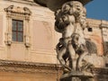 Cupids and vegetables statues on the central column of the Fountain of Shame at Palermo