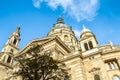 Cupola and tower of Saint Stephen`s Basilica in Budapest, Hungary with blue sky above. Historical sample of neoclassical Royalty Free Stock Photo