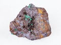 Cuprite and Malachite in Limonite stone on white