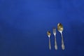 Cupro-nickel spoon, fork and teaspoon. Royalty Free Stock Photo