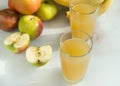 2 cups Apple juice, apples, bananas Royalty Free Stock Photo