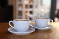 Cups of aromatic coffee on wooden table in cafe, closeup Royalty Free Stock Photo