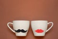 Cups of coffee with icon for ladies and gentleman Royalty Free Stock Photo