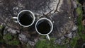 Cups of coffee on a stump in the forrest