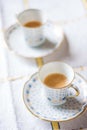 Cups of coffee on the table vertical Royalty Free Stock Photo