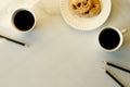 Cups of coffees on white marble table in morning light Royalty Free Stock Photo