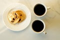 Cups of coffees on white marble table in morning light Royalty Free Stock Photo