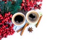 Cups of fragrant coffee on a Christmas background