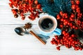 Cups of fragrant coffee on a Christmas background