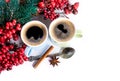Cups of fragrant coffee on a Christmas background