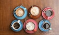 Cups of fresh aromatic coffee on wooden table Royalty Free Stock Photo