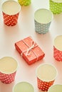 Cups and gift boxes wrapped in polka dots colorful paper Royalty Free Stock Photo