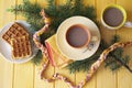 Cups of hot cacao with belgian waffels, christmas hugge cozy home top view