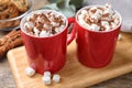 Cups of tasty cocoa with marshmallows Royalty Free Stock Photo